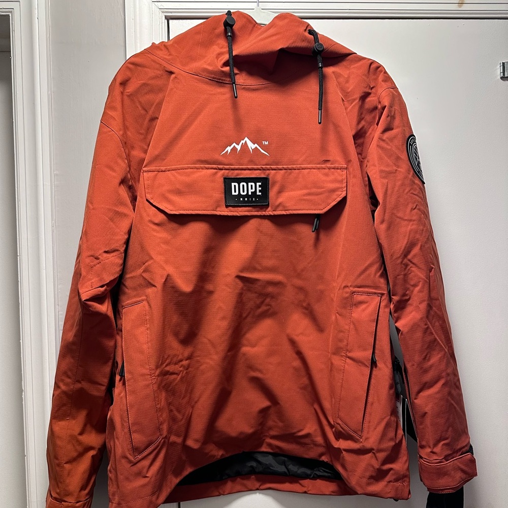 Dope snow blizzard pullover shell new with tag in color rust women’s large